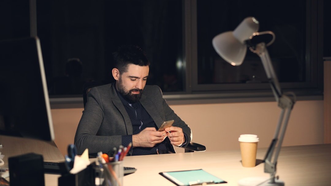 mysterious writer at desk with lamp