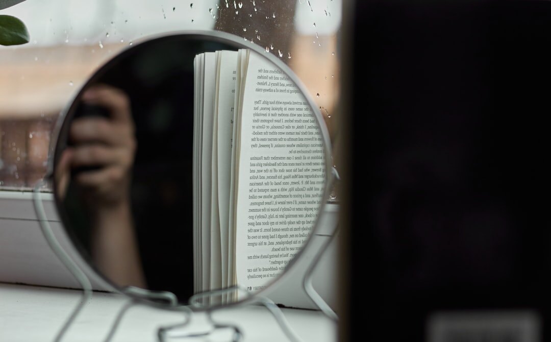 open book with magnifying glass